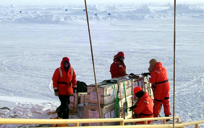 Scientists on ice floe.